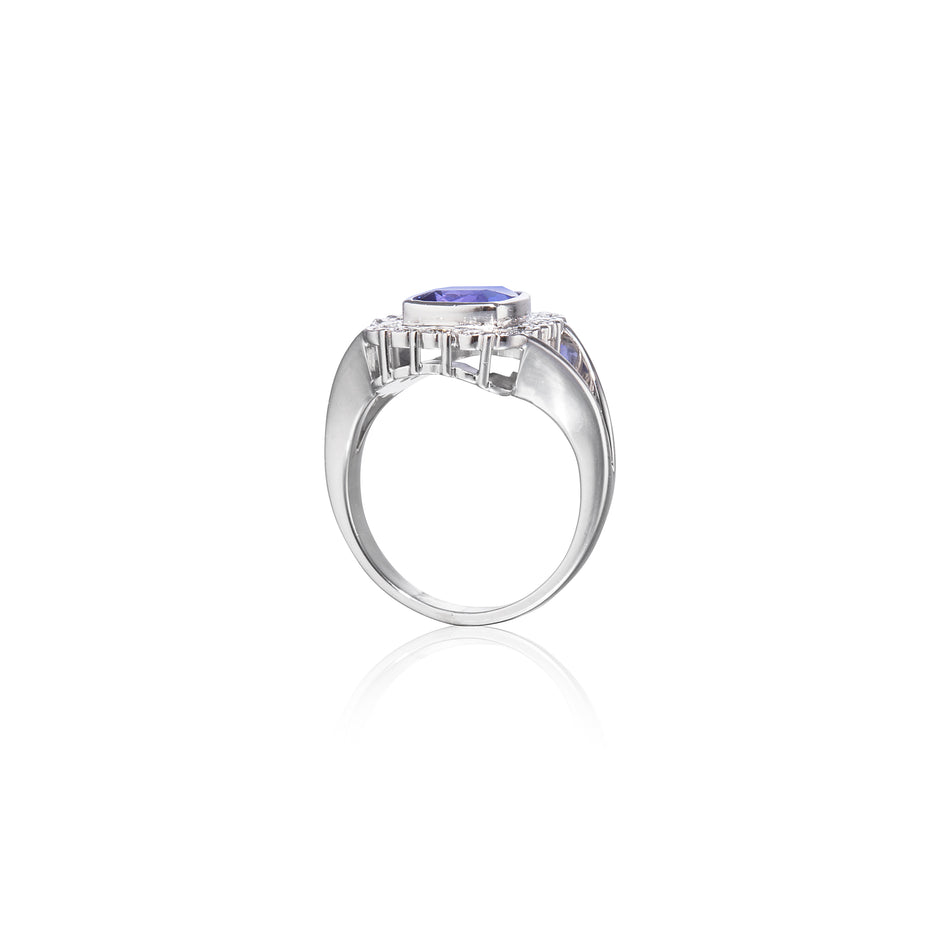18ct White Gold Cushion Cut Tanzanite and Diamond Halo Ring