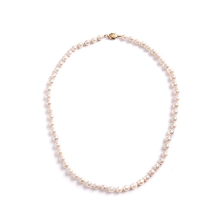 String of Semi Baroque Pearls Secured with a 9ct Yellow Gold Clasp