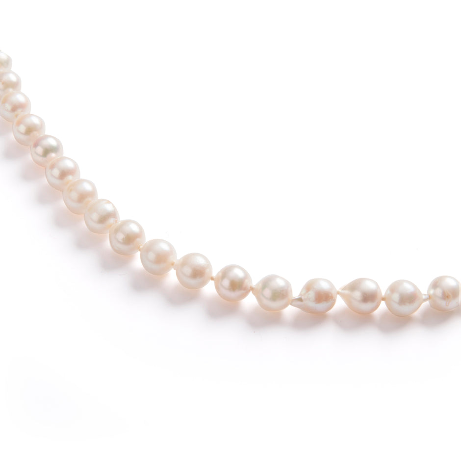 String of Semi Baroque Pearls Secured with a 9ct Yellow Gold Clasp