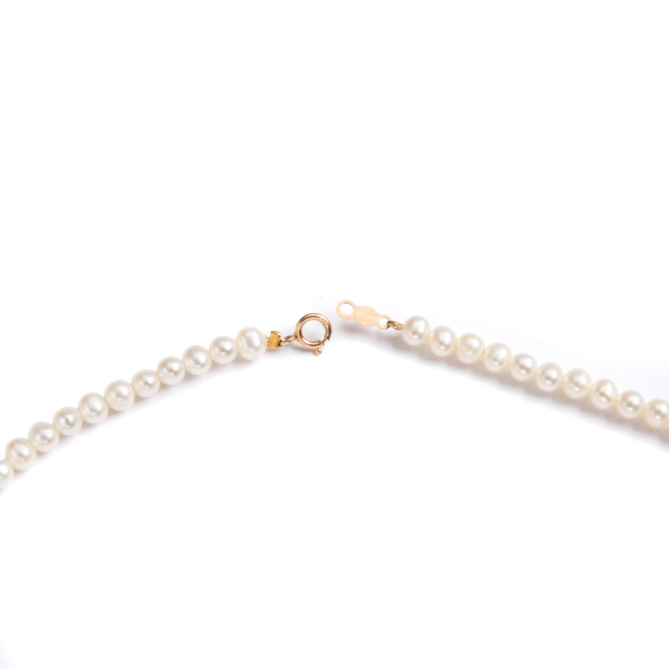 String of Fresh Water Pearls Secured with a 14ct Yellow Gold Clasp