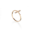 Yellow Gold ring with a cross design on a white background