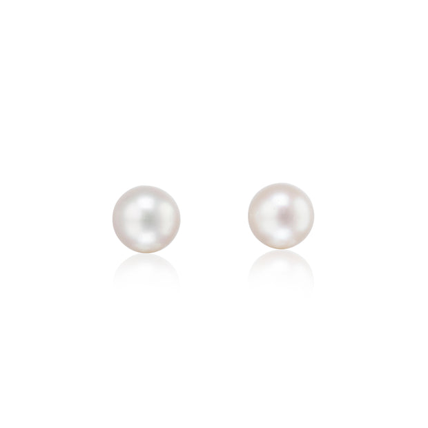 Pair of pearl earrings on a white background