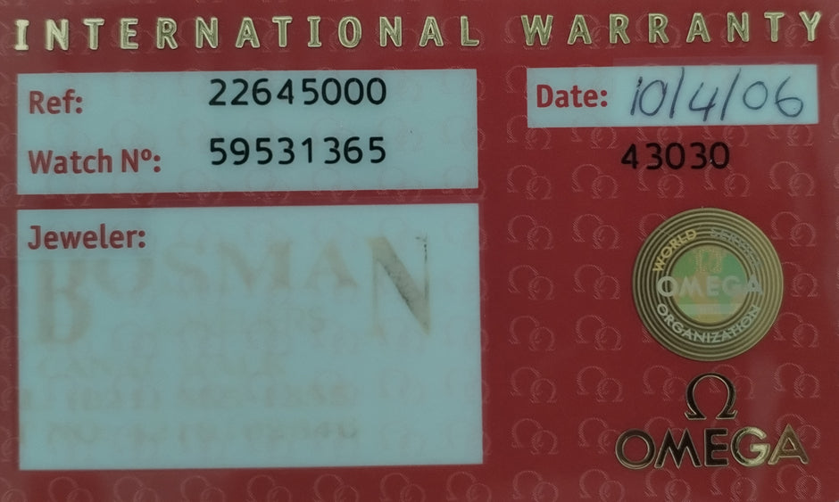 A red International Warranty card for an Omega watch, showing reference number 22645000, watch number 59531365, date 10/14/06, and a gold Omega seal.