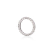 A platinum eternity ring set with round brilliant-cut diamonds, shown on a clean white background with a soft reflection below.