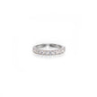 Platinum ring with small diamonds on a white background