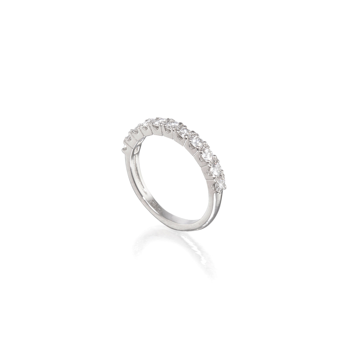 Platinum ring with small stones on a white background
