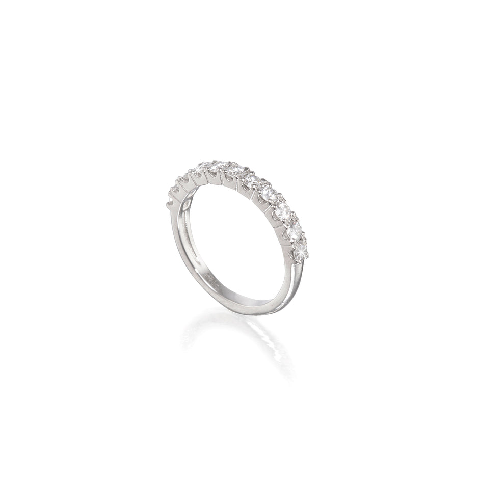 Platinum ring with small stones on a white background