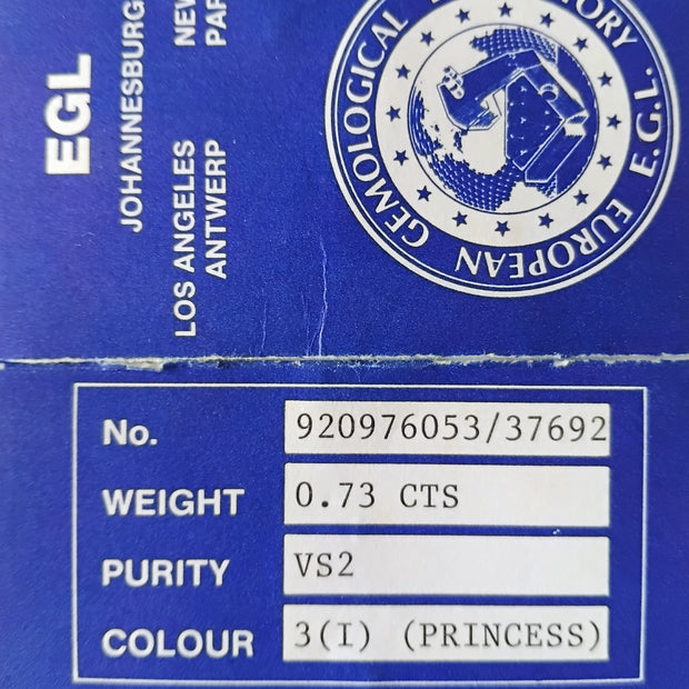 Diamond certification card with EGL logo and diamond details on a blue background
