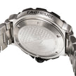 Close-up of the back of a TAG Heuer watch showing the brushed stainless steel case back with engraved details and the brand name 'TAG Heuer' on the crown guard.